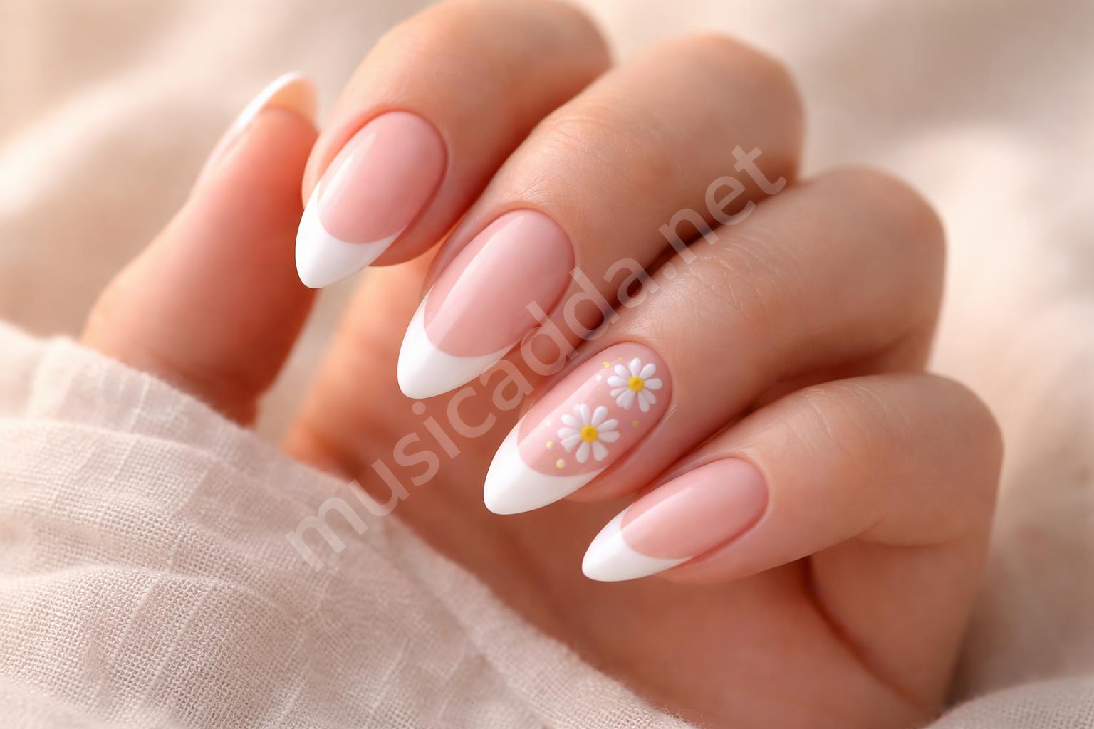 Blush pink daisy french tip nails