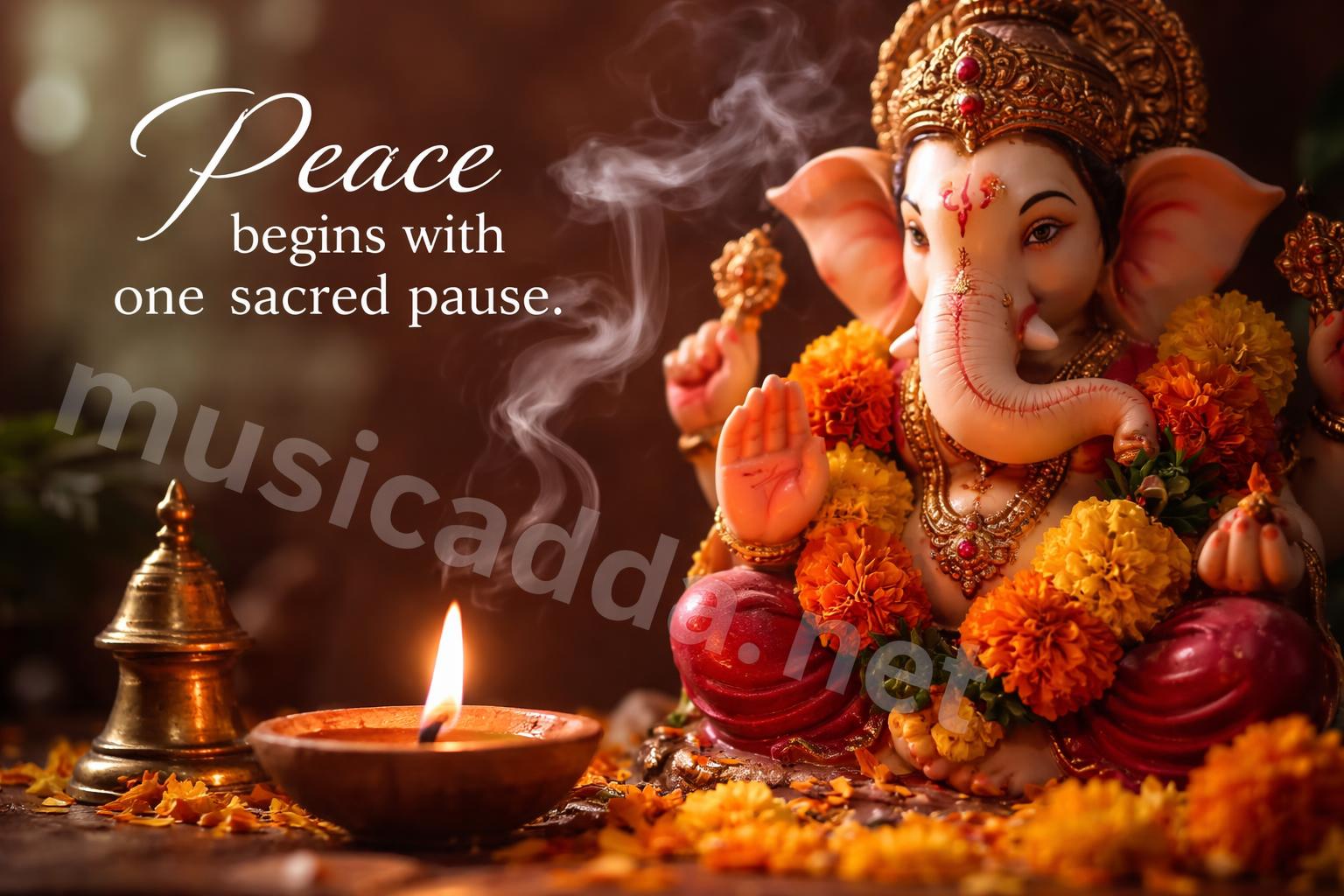 Close up ganesh idol with bell and flowers