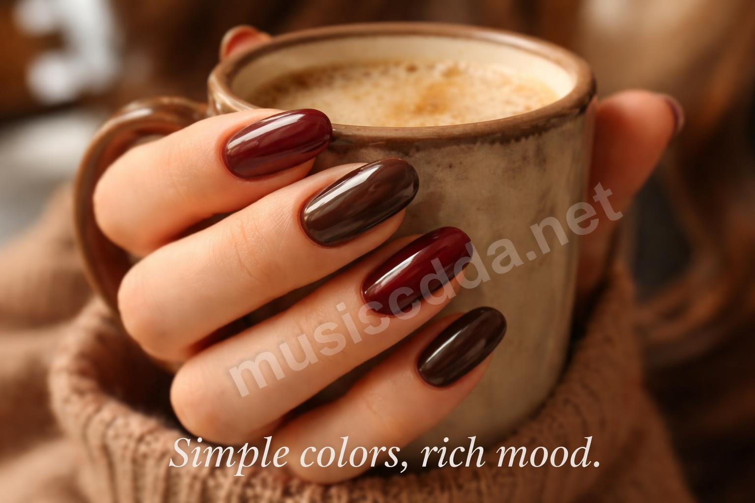 Glossy burgundy and chocolate brown nail art