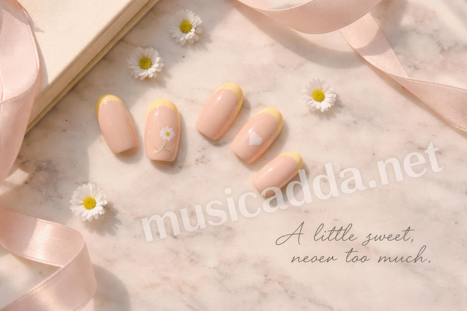 Yellow french tip nails with daisies and hearts