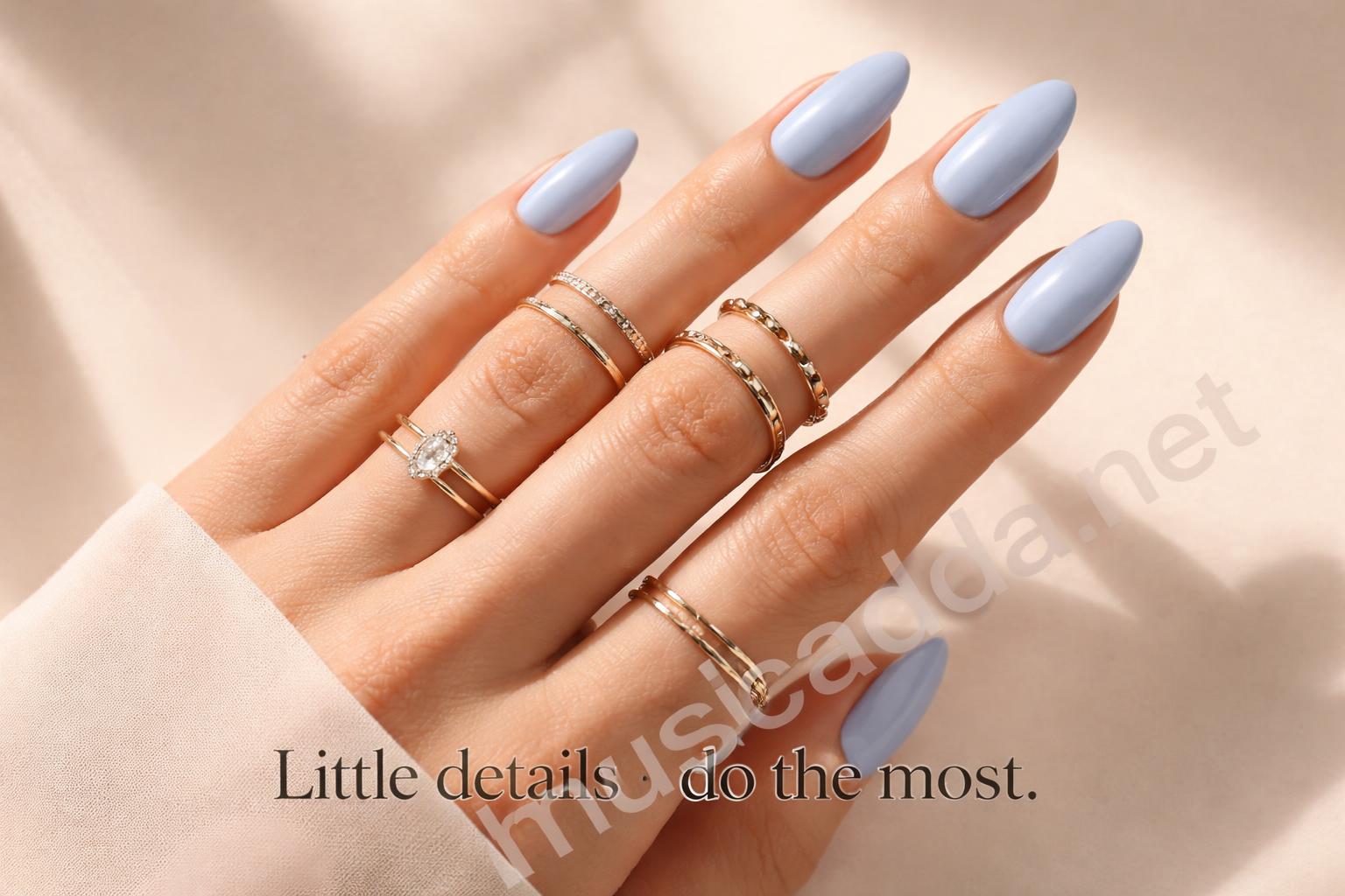 Expensive looking baby blue nails with rings