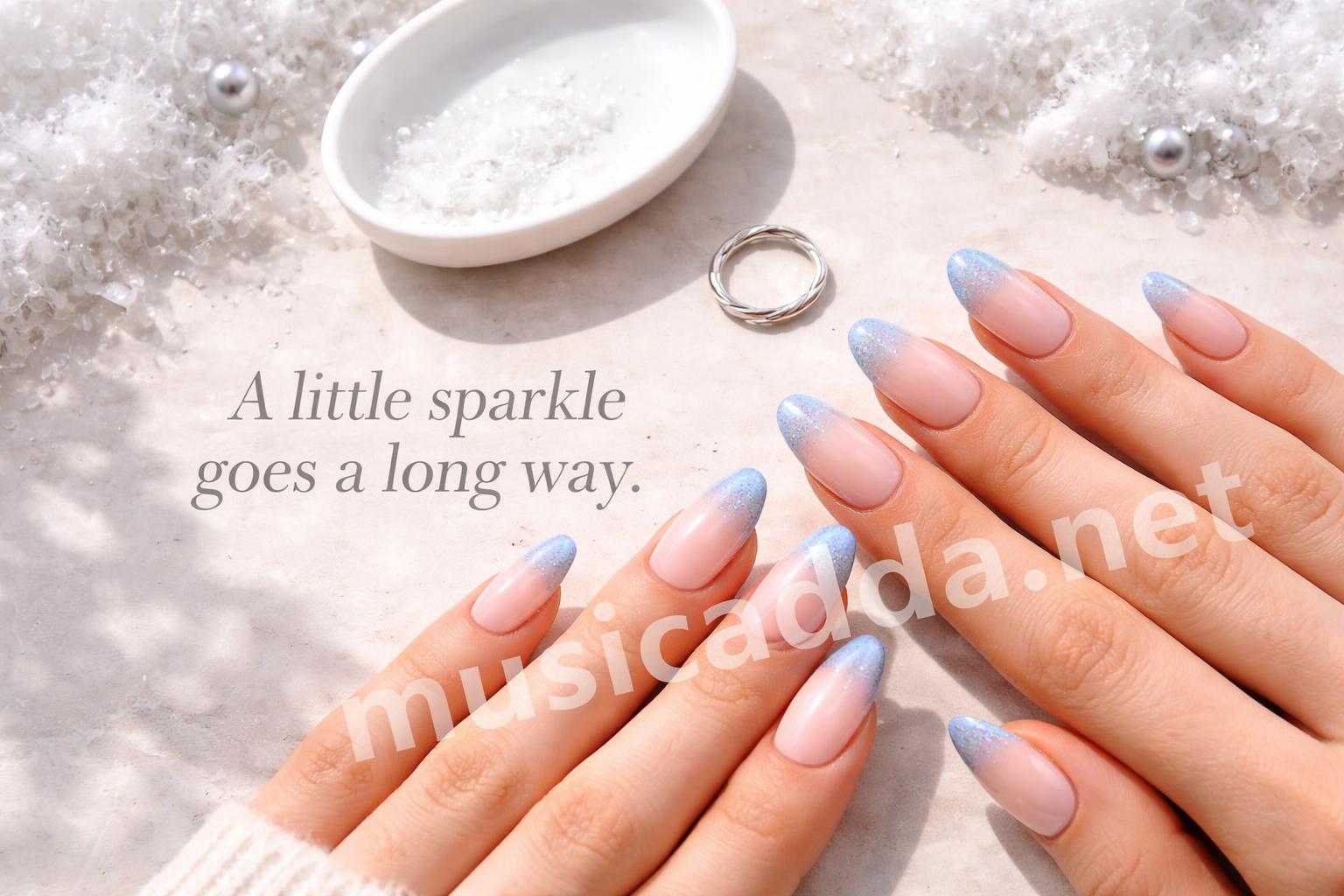 Glitter icy blue french tip manicure